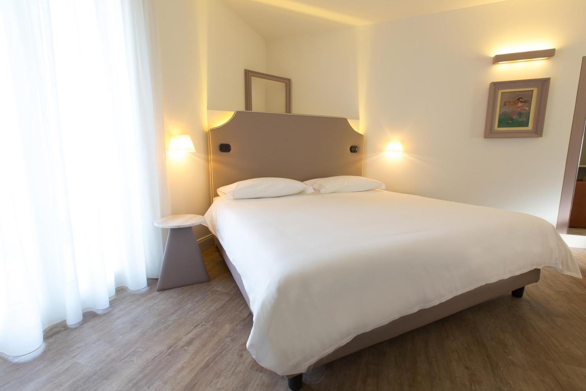 Hotel Al Campanile - Luxury Suites & Apartments Baveno Dış mekan fotoğraf