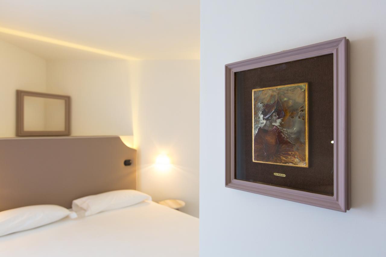 Hotel Al Campanile - Luxury Suites & Apartments Baveno Dış mekan fotoğraf